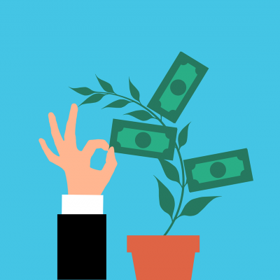 une main avec des billets représentant les impayés